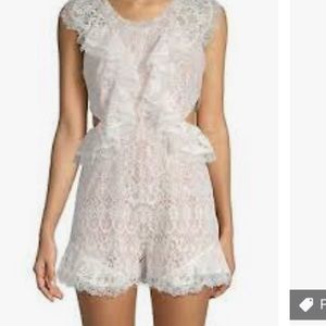 Alexis Lace Ruffle Side Cutout Romper